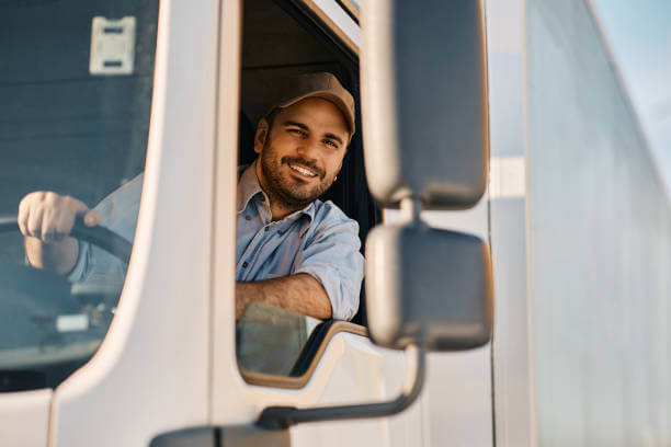 Trucker Smiling Behind the wheel